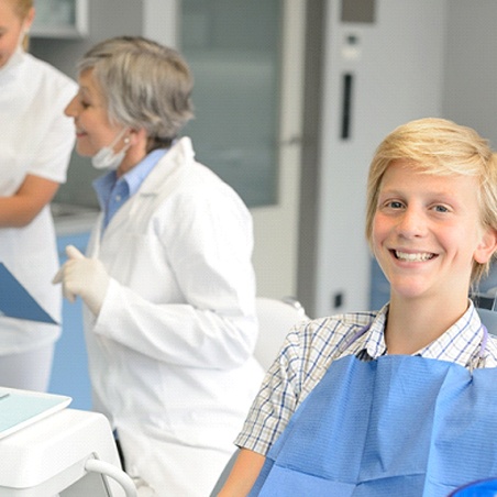 Teen receiving dental checkup in Wylie