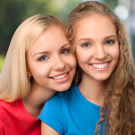 Two teenage girls smiling in Wylie