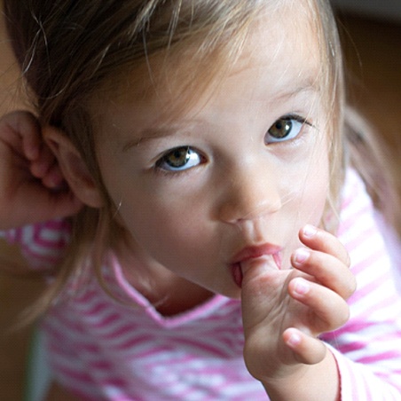 Girl sucking her thumb in Wylie