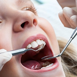 a child getting an emergency dentistry checkup in Wylie