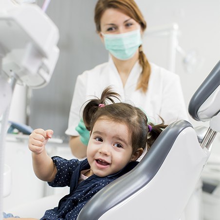 Little boy smiling during first pediatric dental visit