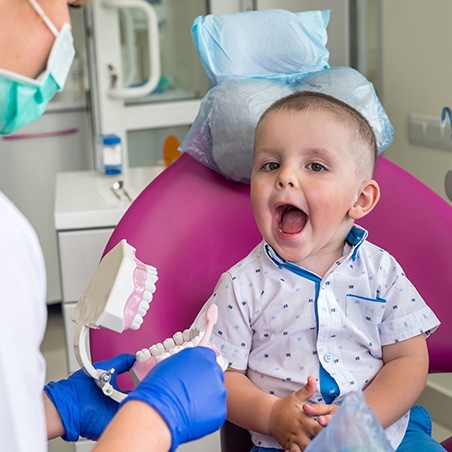 Little boy smiling after first pediatric dental visit