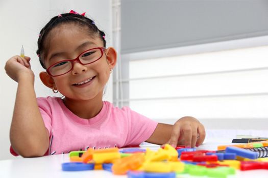 Girl playing with toys