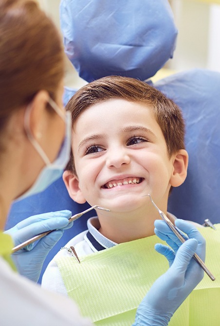Boy smiling in the dental chair