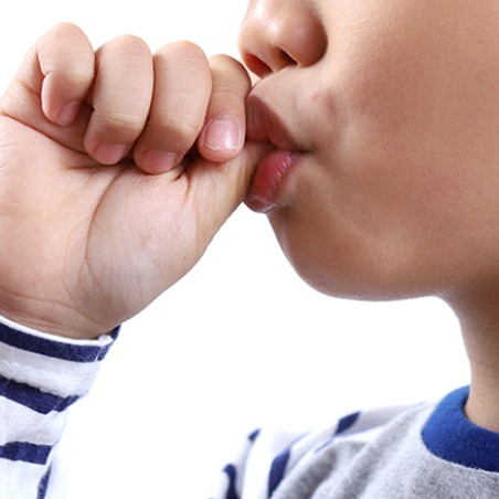 An up-close view of a boy sucking his thumb in Wylie