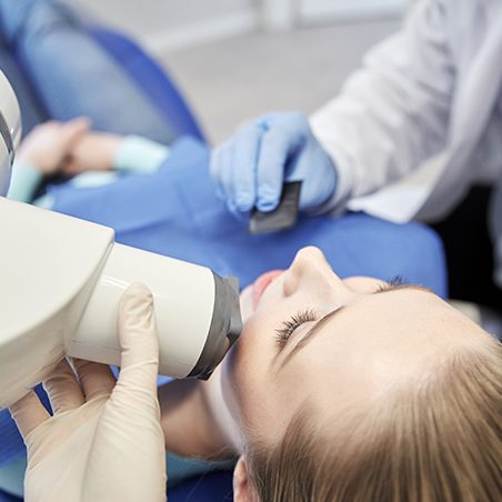 Child receiving dental x-ray