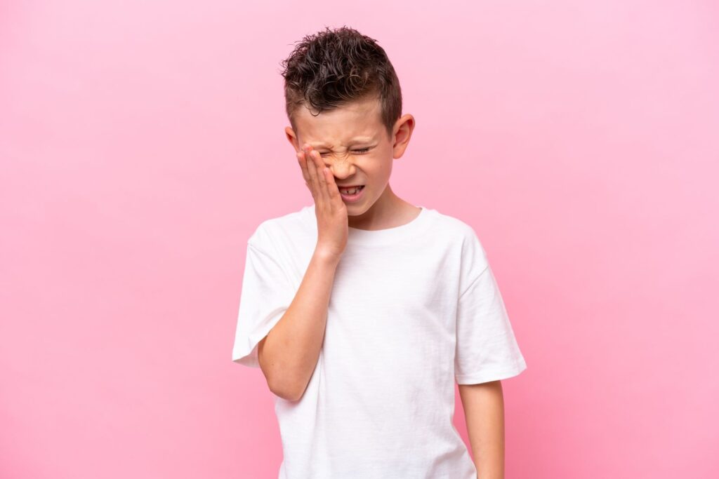 A little boy with jaw pain